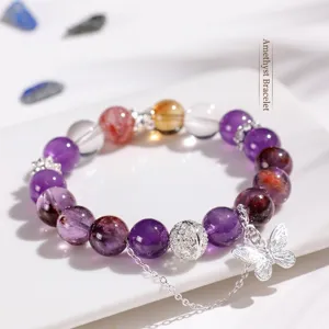 Elegante pulsera de cuentas de amatista púrpura con dije de mariposa de plata y cristales variados