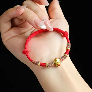 Bracelet de corde tressée rouge de l'année du serpent avec charme chanceux