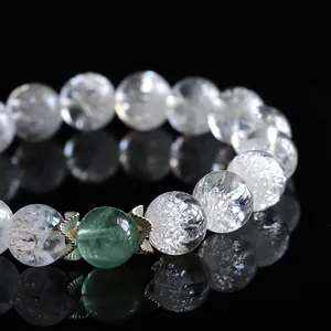 Elegante bracciale in argento 925 con cristalli a fuochi d'artificio e prehnite verde.