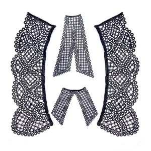 Detailed macro view showing the intricate pattern of black water-soluble lace embroidery collar