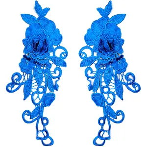 Detailed pair of vibrant blue 3D water-soluble lace floral appliques for DIY sewing decor