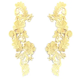 Detailed view of symmetrical 3D water-soluble lace floral embroidery patches for DIY