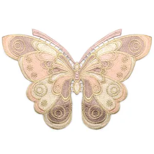 Detailed macro view of a large pink and gold embroidered butterfly lace patch collar