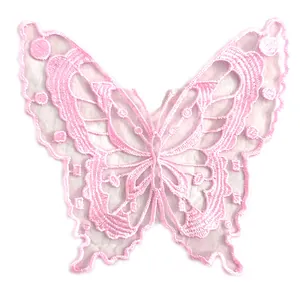 Detailed view of a pink embroidered butterfly patch made of delicate organza lace