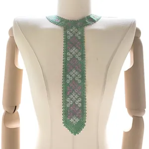 Detailed back view of green embroidered lace collar on a mannequin torso