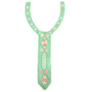 Detailed view of mint green embroidered lace fake collar with floral tie-shape pattern