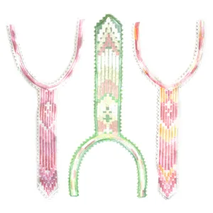 Set of three colorful embroidered lace collar patches with geometric tribal design