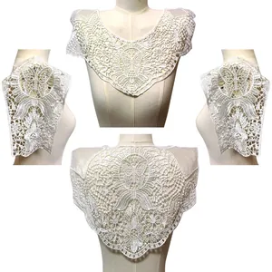 Detail view of 4-piece white water-soluble lace embroidery collar and sleeve set