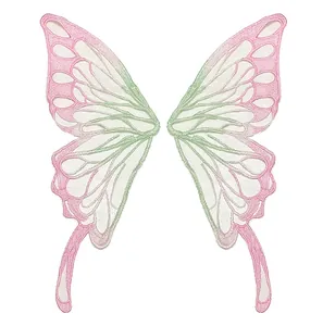 Detailed view of pink and green butterfly lace embroidery patches for DIY clothing