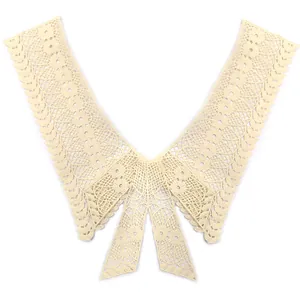 Detailed view of cream bow lace embroidery faux collar accessory