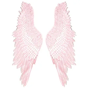 Detailansicht der rosa wasserlöslichen Polyester-Spitzenflügel-Stickereiaufnäher