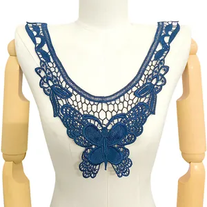 Detailed view of blue water-soluble lace collar with butterfly embroidery pattern