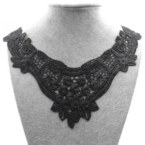 Detailed view of black water-soluble lace collar with elegant embroidery and hollow-out flowers