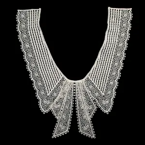 Detailed view of white milk silk lace collar with elegant bow embroidery pattern