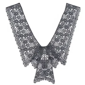 Detailed macro view of an intricate grey floral lace decorative collar accessory