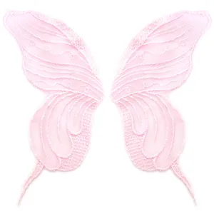 Detailed macro view of pink embroidered lace butterfly patches showing delicate mesh texture