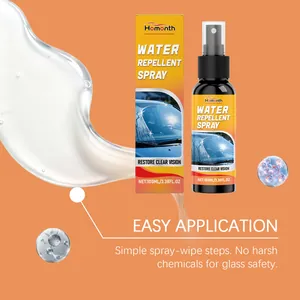Nahaufnahme des Auto-Glas-Regenabweisers mit Sprühflasche, Verpackung und Spritzern