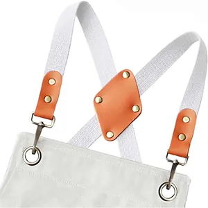 Adjustable cross back canvas apron straps replacement with leather patches detail.