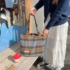 Detailed view of vintage plaid wool tote bag, casual daily shoulder bag with large capacity.