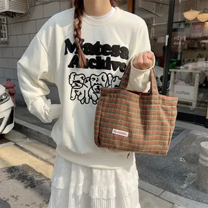 Stylish retro plaid woolen handbag for women, vintage casual tote bag with handles for autumn daily.