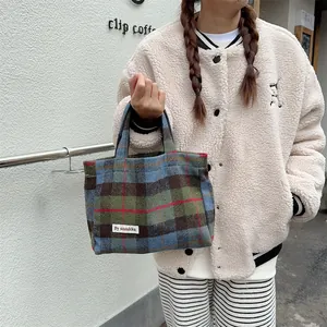 Vintage plaid woolen handbag for women, casual retro autumn winter tote bag style.