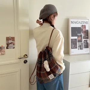 Sac a dos de style coreen a carreaux et cordon pour femmes, vue de detail sac bandouliere.
