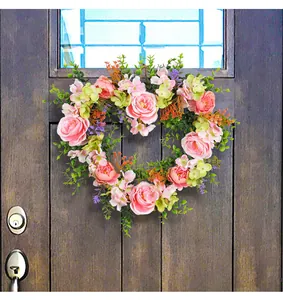 Heart-shaped artificial rose floral wreath door hanging decoration for wedding and holiday party.