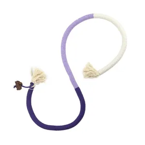 Colorful braided cat chew rope toy with frayed ends and molar stick for kittens and cats