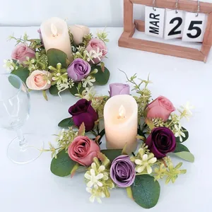 Artificial eucalyptus candle ring set with colorful roses, perfect for home and holiday table decor.
