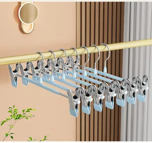Cintres à pantalon en acier inoxydable avec pinces, cintres réglables pour la maison.
