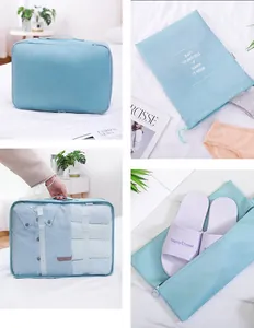 Detailansicht der Reisetasche mit leichtem Stoff und ordentlicher Kofferorganisation.
