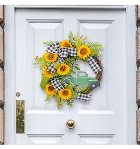 Couronne de tournesol de printemps avec camionnette verte et nœud vichy pour porte.