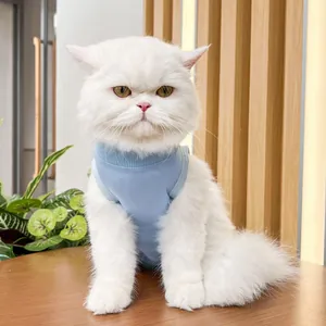 Detail shot of soft blue pet recovery suit for cats, comfortable elastic fabric for daily wear.
