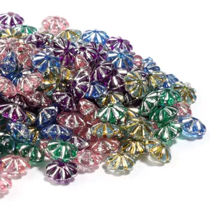 Colorful plastic pumpkin spacer beads with silver plated edges for DIY jewelry making.