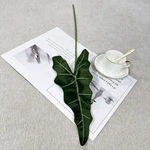 Detailed view of single artificial alocasia leaf for home decor and green plant walls.