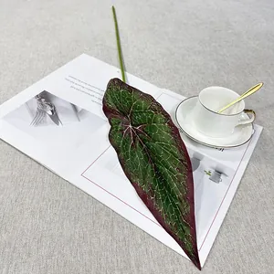 Artificial taro leaf detail shot, perfect for home decor, green plant wall and floral arrangement.