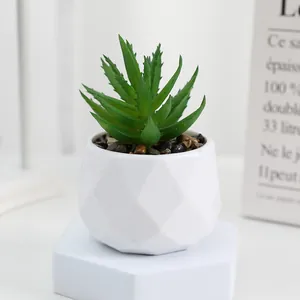 Artificial succulent potted plant with white geometric diamond plastic pot for home decor.