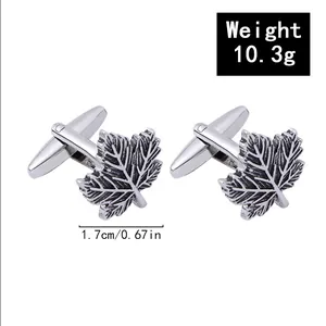 Vintage metal leaf cufflinks for men, classic silver tone shirt cuff links accessory.