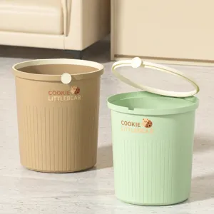 Household plastic trash can with press ring and large opening for kitchen and bathroom use.