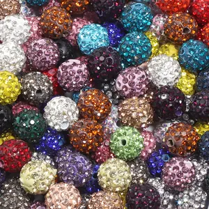 Colorful polymer clay rhinestone disco ball beads for DIY handmade jewelry making crafts.