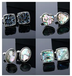 Stylish men shirt cufflinks set with natural abalone shell and sparkling crystal designs.