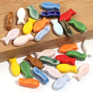 Colorful ceramic fish loose beads for handmade DIY jewelry, bracelets, necklaces, and keychains.