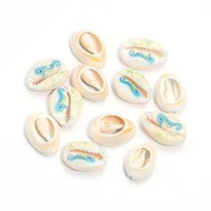 White cowrie shell pendant beads with seahorse print for DIY jewelry making bracelet necklace.