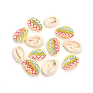 Colorful painted cowrie shell beads detail, perfect for DIY bracelet and necklace crafting.