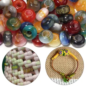 Close-up details of colorful resin cat-eye loose beads, ideal for DIY handmade bracelets and crafts.