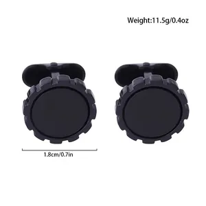 Vista detallada de gemelos de metal negro con dimensiones 1.8cm y peso de 11.5g.