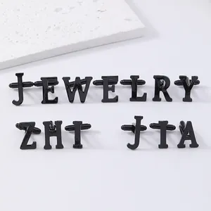 Black letter cufflinks for men French shirt sleeve studs jewelry accessories detail view.