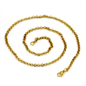 Detailed view of a 2mm gold stainless steel rolo chain necklace with lobster clasp.