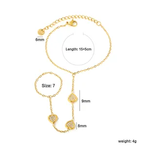 Vue détaillée d'un bracelet de doigt en acier inoxydable doré avec des dimensions.
