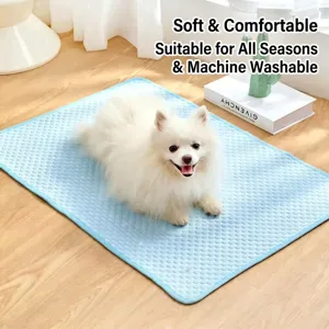 Detail view of a light blue breathable pet cooling mat featuring a soft textured ice silk surface